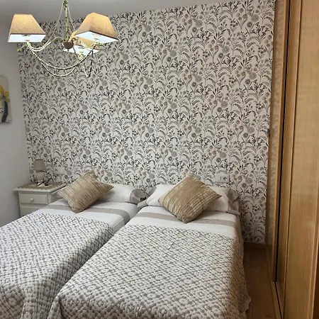 Charming House In Teo With Balcony And Parking Included *